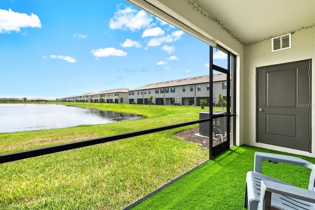 14835 Lyla Ter, Bradenton, FL 34211 - unfurnished sunroom with a water view and a residential view