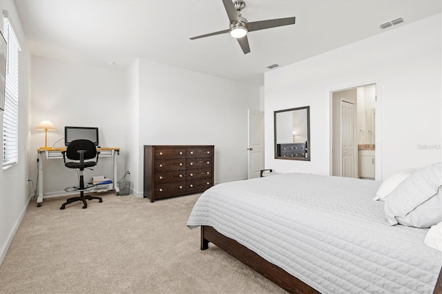 14835 Lyla Ter, Bradenton, FL 34211 - carpeted bedroom featuring an office area, ceiling fan, and connected bathroom