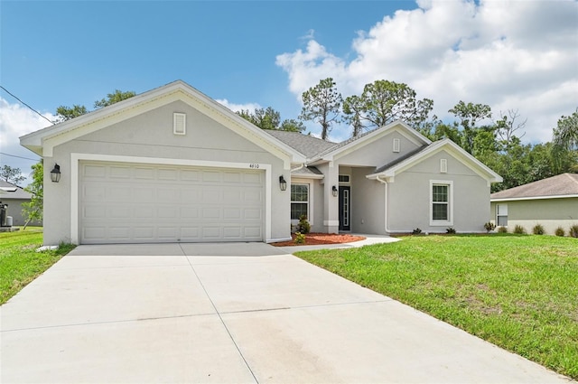 4610 Clarke St, North Port, FL 34286 - ranch-style home featuring stucco siding, concrete driveway, a front yard, and an attached garage