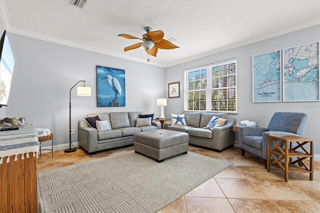 145 50th St, Holmes Beach, FL 34217 - living room featuring crown molding, ceiling fan, and light tile patterned floors