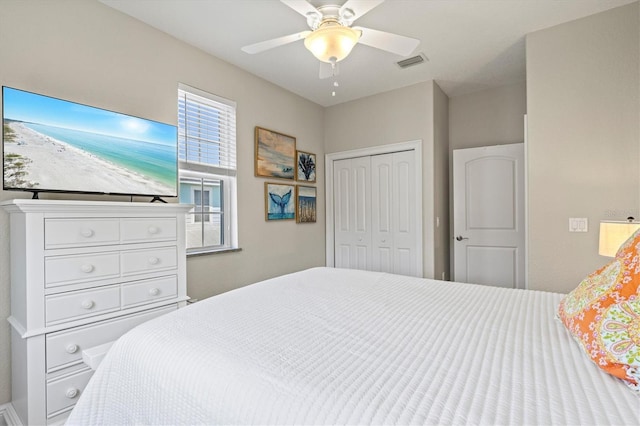145 50th St, Holmes Beach, FL 34217 - bedroom featuring a closet and a ceiling fan