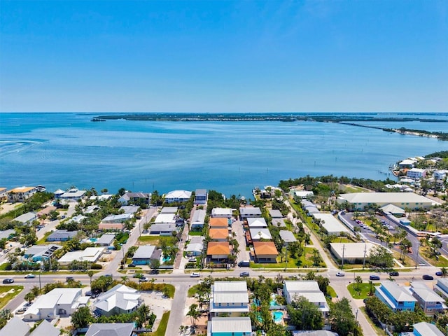 145 50th St, Holmes Beach, FL 34217 - aerial view of residential area featuring a large body of water