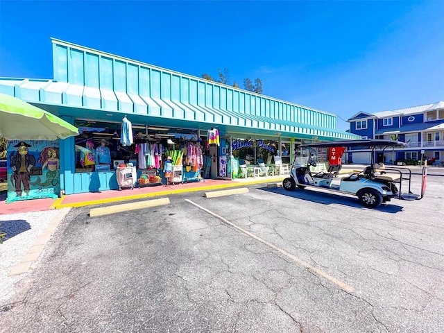 145 50th St, Holmes Beach, FL 34217 - view of property featuring uncovered parking