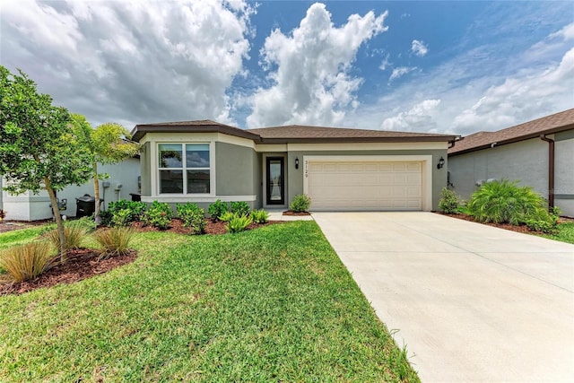 3129 61st Ter E, Ellenton, FL 34222 - ranch-style home featuring stucco siding, a garage, driveway, and a front yard