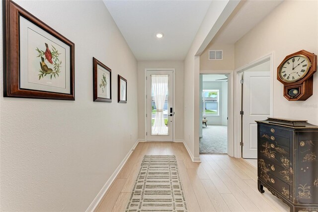 3129 61st Ter E, Ellenton, FL 34222 - entryway with light wood-style flooring, baseboards, and recessed lighting