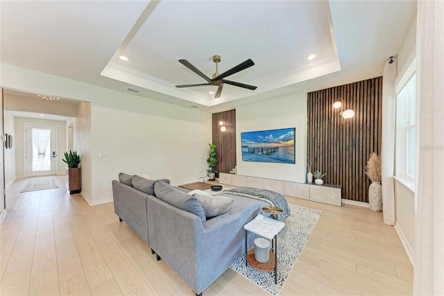 3129 61st Ter E, Ellenton, FL 34222 - living area featuring a raised ceiling, light wood finished floors, a ceiling fan, recessed lighting, and baseboards