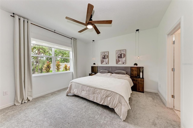 3129 61st Ter E, Ellenton, FL 34222 - bedroom featuring light carpet, baseboards, and ceiling fan