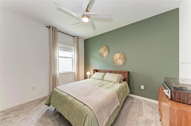 3129 61st Ter E, Ellenton, FL 34222 - bedroom with light carpet, baseboards, and ceiling fan