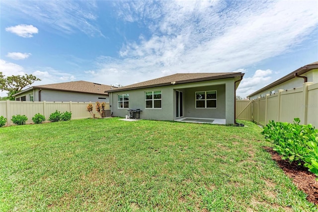 3129 61st Ter E, Ellenton, FL 34222 - back of house featuring stucco siding and a patio