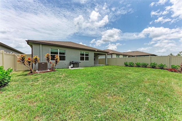 3129 61st Ter E, Ellenton, FL 34222 - back of house featuring stucco siding and central air condition unit