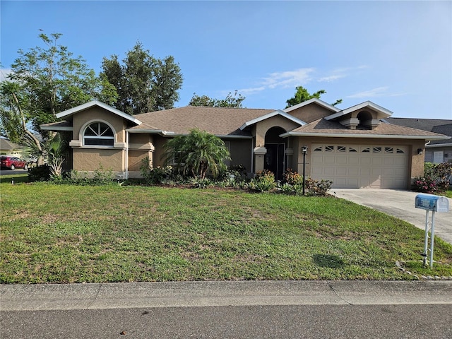 3110 57th Avenue Cir E, Bradenton, FL 34203 - ranch-style house featuring a garage, stucco siding, a front yard, and concrete driveway
