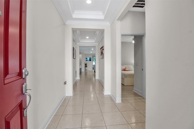 3712 76th St E, Palmetto, FL 34221 - foyer with a tray ceiling, crown molding, recessed lighting, light tile patterned floors, and baseboards