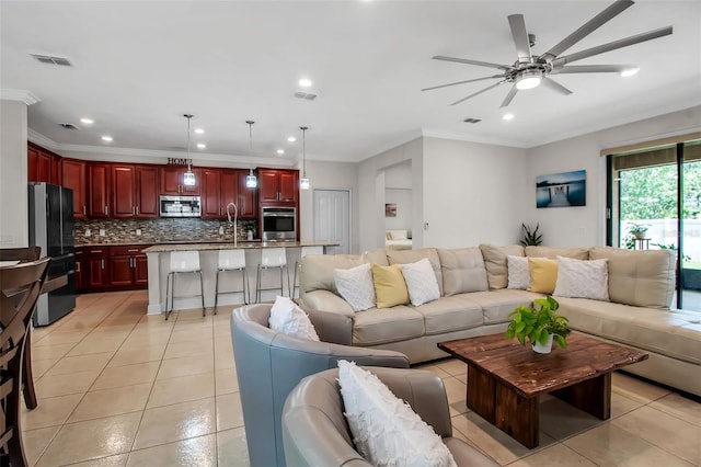3712 76th St E, Palmetto, FL 34221 - living area featuring ceiling fan, crown molding, light tile patterned floors, and recessed lighting