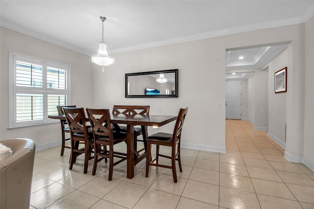 3712 76th St E, Palmetto, FL 34221 - dining area featuring light tile patterned floors, crown molding, baseboards, and a chandelier
