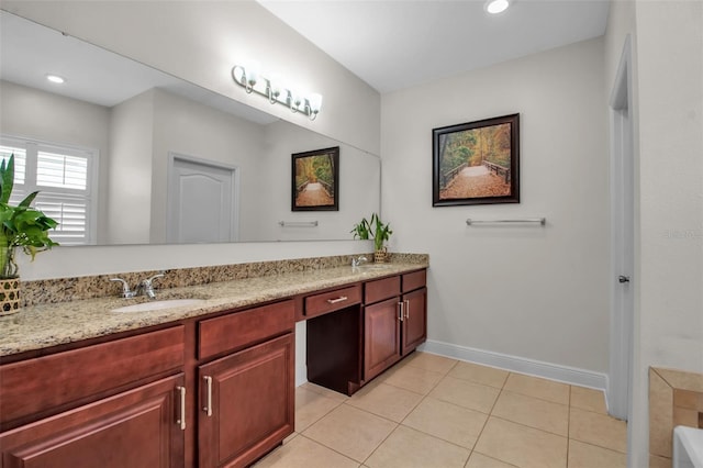 3712 76th St E, Palmetto, FL 34221 - bathroom featuring double vanity, baseboards, tile patterned floors, and recessed lighting