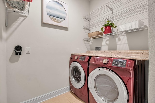 3712 76th St E, Palmetto, FL 34221 - laundry area featuring washing machine and dryer, baseboards, and tile patterned floors