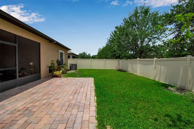 3712 76th St E, Palmetto, FL 34221 - view of yard with a patio area and cooling unit