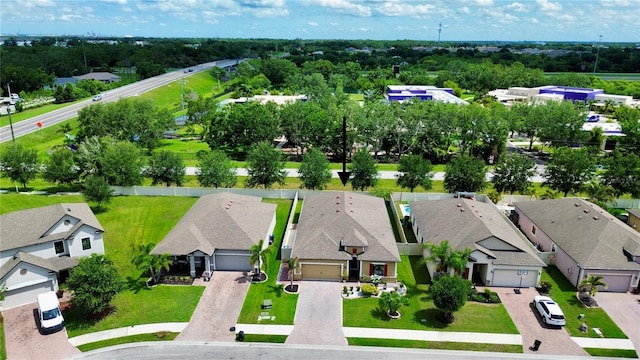 3712 76th St E, Palmetto, FL 34221 - aerial view of residential area featuring a tree filled landscape