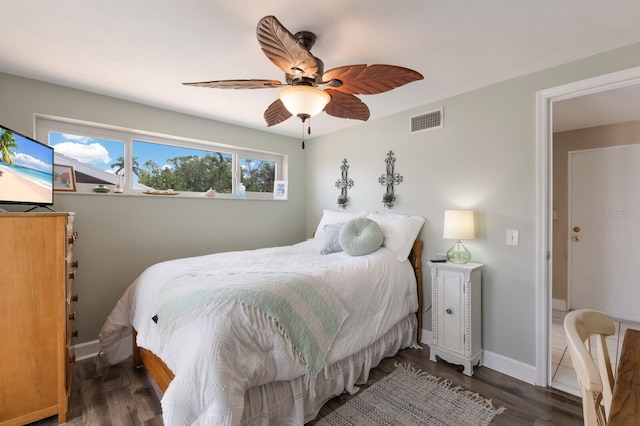 715 Fontana Ln, Bradenton, FL 34209 - bedroom featuring wood finished floors, ceiling fan, and baseboards