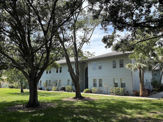 10800 N US Highway 19 Unit 237, Pinellas Park, FL 33782 - view of front of house featuring a front lawn and central air condition unit