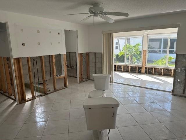 683 Spanish Dr S, Longboat Key, FL 34228 - spare room featuring light tile patterned flooring and a ceiling fan