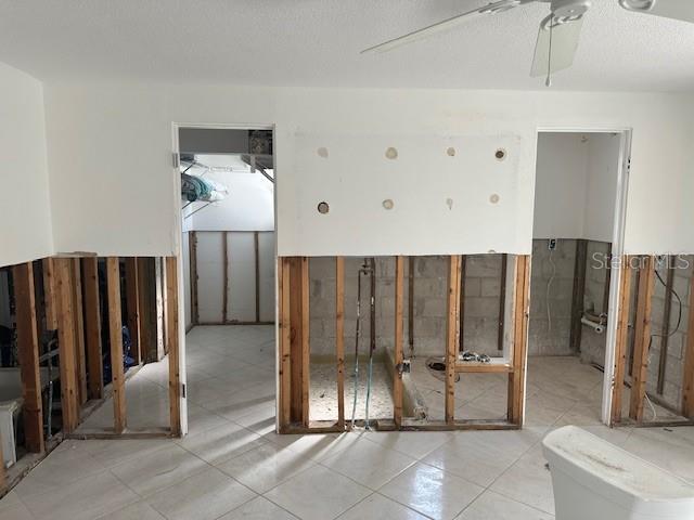 683 Spanish Dr S, Longboat Key, FL 34228 - misc room featuring a ceiling fan and tile patterned floors