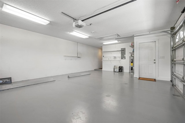 4472 Calle Serena, Sarasota, FL 34238 - garage with electric panel and a garage door opener