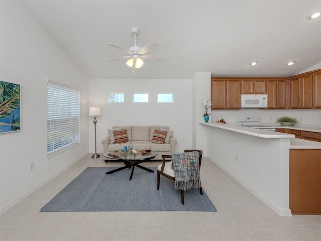12682 Shimmering Oak Cir, Venice, FL 34293 - living area with a ceiling fan, vaulted ceiling, light tile patterned floors, and recessed lighting