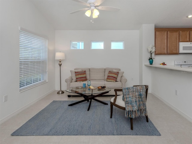 12682 Shimmering Oak Cir, Venice, FL 34293 - living area featuring ceiling fan and light tile patterned flooring