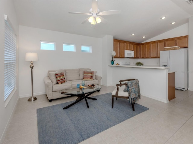 12682 Shimmering Oak Cir, Venice, FL 34293 - living room with recessed lighting, ceiling fan, light tile patterned flooring, and lofted ceiling