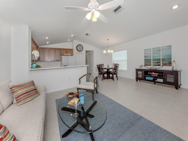 12682 Shimmering Oak Cir, Venice, FL 34293 - living room featuring lofted ceiling, a chandelier, ceiling fan, light tile patterned flooring, and recessed lighting