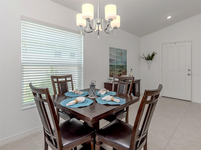 12682 Shimmering Oak Cir, Venice, FL 34293 - dining room with a chandelier, light tile patterned floors, and vaulted ceiling