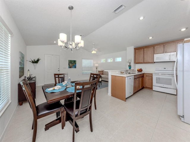 12682 Shimmering Oak Cir, Venice, FL 34293 - dining area with lofted ceiling, a chandelier, recessed lighting, light tile patterned flooring, and ceiling fan