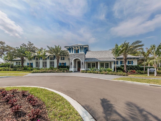 12682 Shimmering Oak Cir, Venice, FL 34293 - view of front of house with stone siding and stucco siding