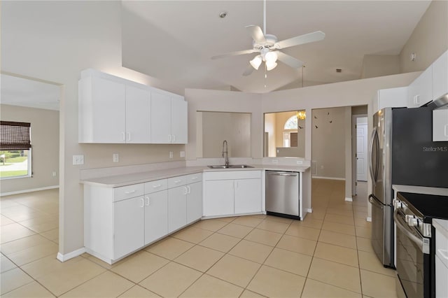 2662 6th Ct E, Ellenton, FL 34222 - kitchen featuring stainless steel appliances, a sink, light countertops, ceiling fan, and plenty of natural light