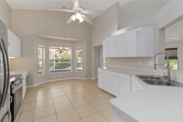2662 6th Ct E, Ellenton, FL 34222 - kitchen with a sink, appliances with stainless steel finishes, a ceiling fan, a chandelier, and light countertops