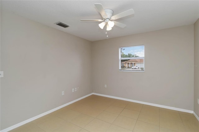 2662 6th Ct E, Ellenton, FL 34222 - spare room with baseboards, a ceiling fan, and light tile patterned floors