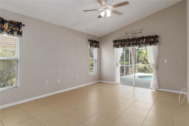 2662 6th Ct E, Ellenton, FL 34222 - unfurnished room featuring baseboards, lofted ceiling, a ceiling fan, and light tile patterned flooring