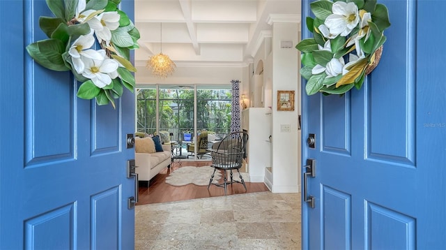 1864 Goldenrod St, Sarasota, FL 34239 - foyer featuring stone finish flooring, beam ceiling, and coffered ceiling