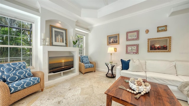 1864 Goldenrod St, Sarasota, FL 34239 - living room featuring crown molding, a fireplace, a raised ceiling, and stone finish floors