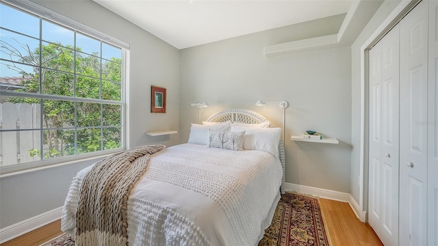 1864 Goldenrod St, Sarasota, FL 34239 - bedroom with wood finished floors and a closet