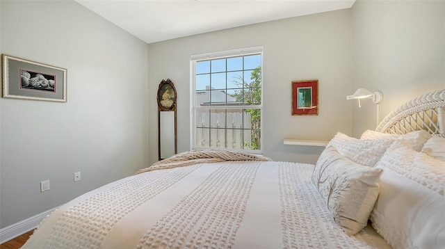 1864 Goldenrod St, Sarasota, FL 34239 - bedroom with baseboards and wood finished floors