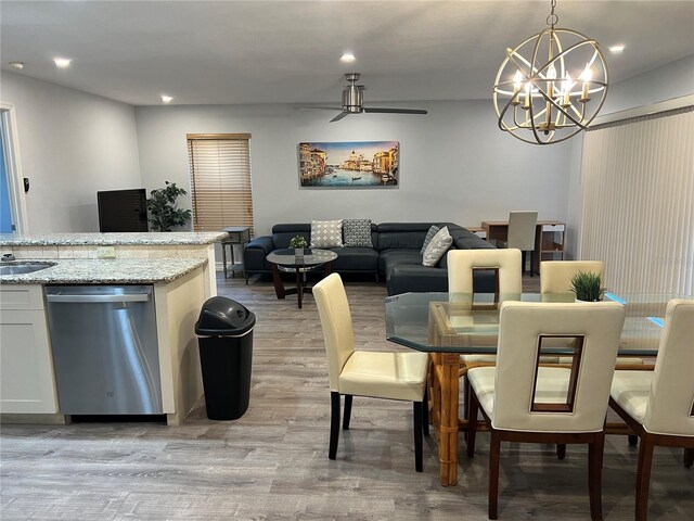 4441 Groveland Ave, Sarasota, FL 34231 - dining room with light wood-style floors, a chandelier, recessed lighting, and ceiling fan
