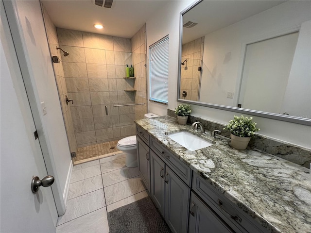 4441 Groveland Ave, Sarasota, FL 34231 - bathroom featuring vanity, a stall shower, toilet, and recessed lighting