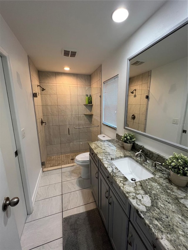 4441 Groveland Ave, Sarasota, FL 34231 - full bathroom with a shower stall, vanity, toilet, marble finish floors, and recessed lighting