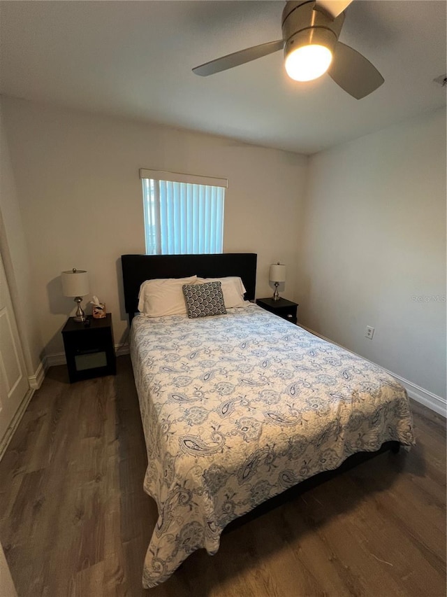 4441 Groveland Ave, Sarasota, FL 34231 - bedroom featuring dark wood-style floors, baseboards, and a ceiling fan