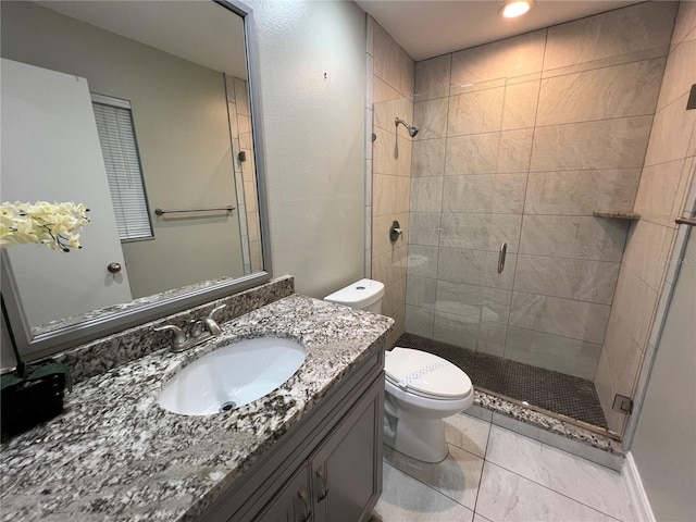 4441 Groveland Ave, Sarasota, FL 34231 - bathroom featuring a shower stall, toilet, vanity, tile patterned floors, and recessed lighting