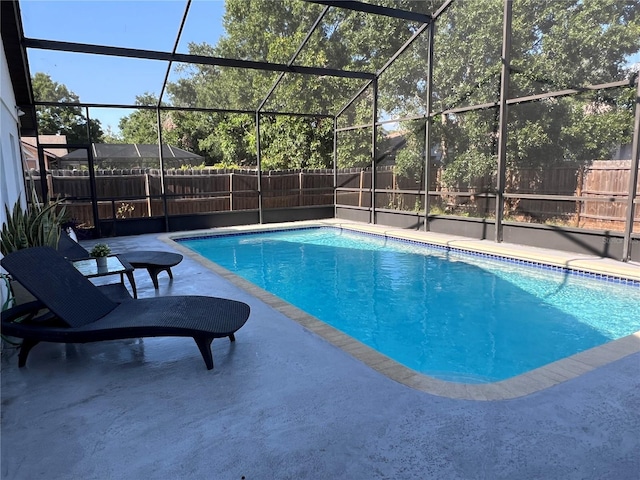 4441 Groveland Ave, Sarasota, FL 34231 - view of swimming pool featuring a fenced backyard, a patio area, and a lanai