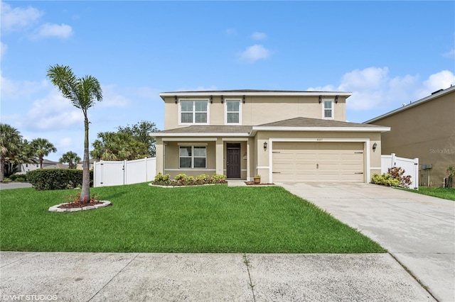 4005 Willow Branch Pl, Palmetto, FL 34221 - traditional home with stucco siding, driveway, a garage, and a gate