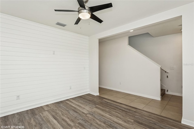 4005 Willow Branch Pl, Palmetto, FL 34221 - spare room with wood finished floors, stairs, baseboards, ceiling fan, and recessed lighting